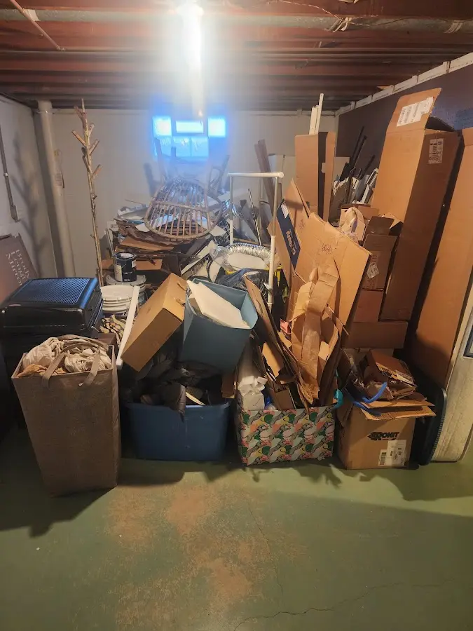 Roll-off dumpster container at job site for 2 Yard Dumpster Rental in Fairwood